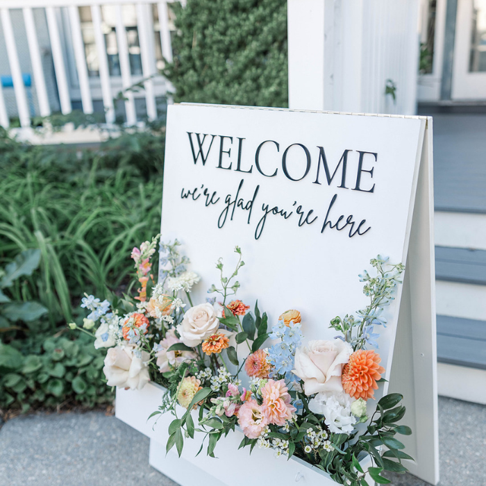 Wedding welcome sign with florals